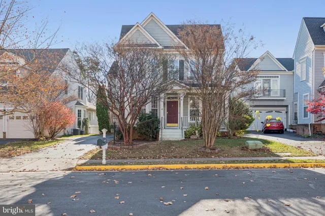a view of a street with a building in the background