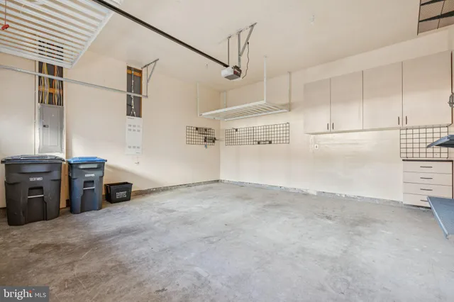 a view of a storage & utility room with racks on the wall