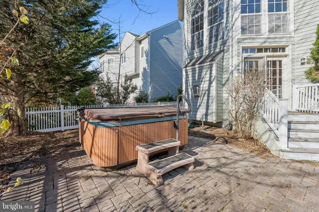 a view of a backyard with a table and chair