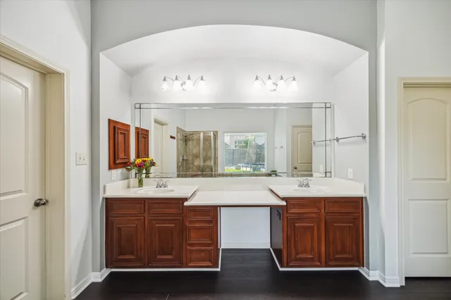 a bathroom with a sink and a mirror