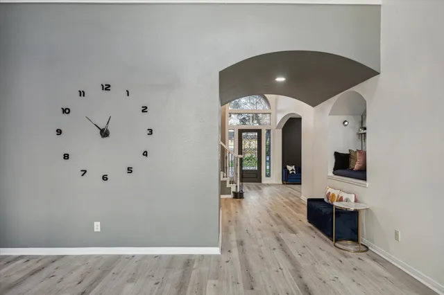 a view of a livingroom with wooden floor