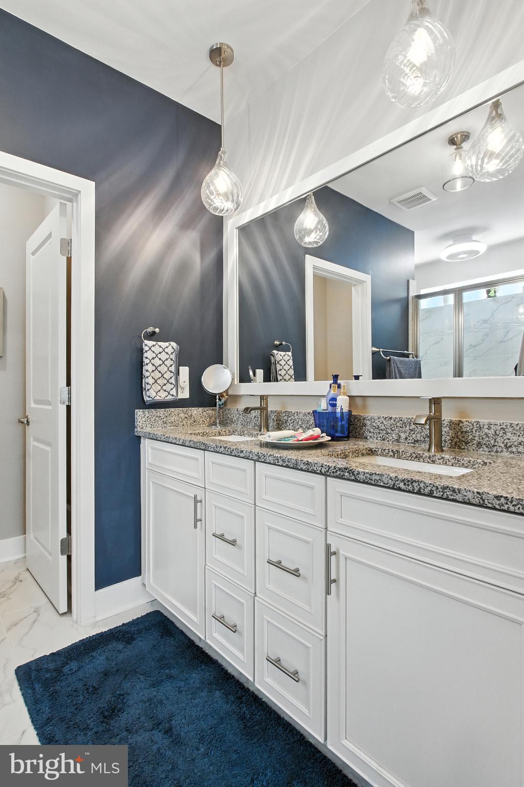 33 Tulip Tree Way Gettysburg, PA 17325 - Photo 12 of 34 a bathroom with a granite countertop sink mirror and vanity