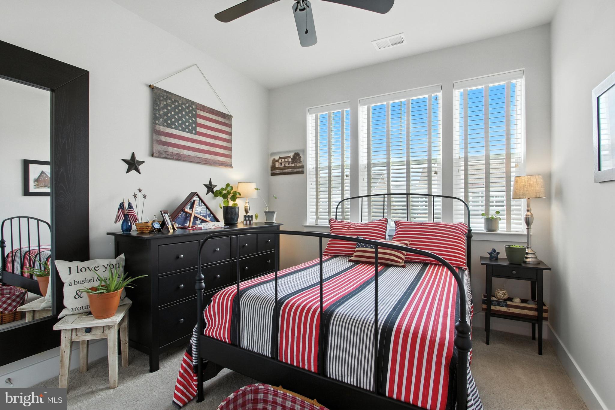 33 Tulip Tree Way Gettysburg, PA 17325 - Photo 13 of 34 a bedroom with a bed and wooden floor
