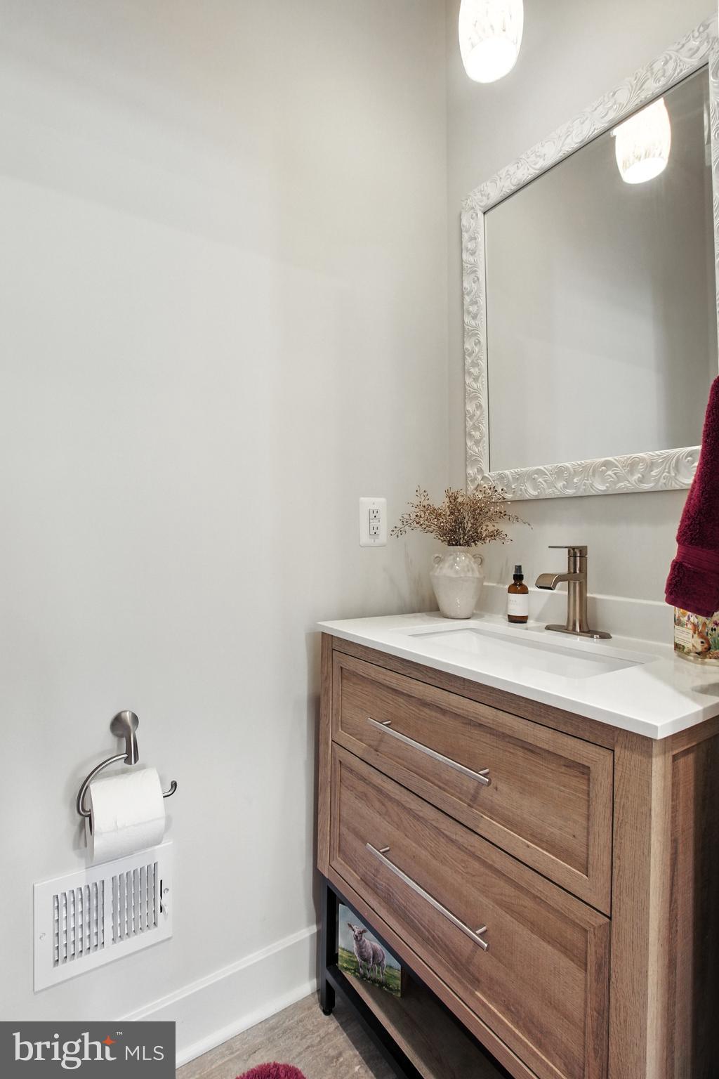 33 Tulip Tree Way Gettysburg, PA 17325 - Photo 14 of 34 a bathroom with a sink and a mirror