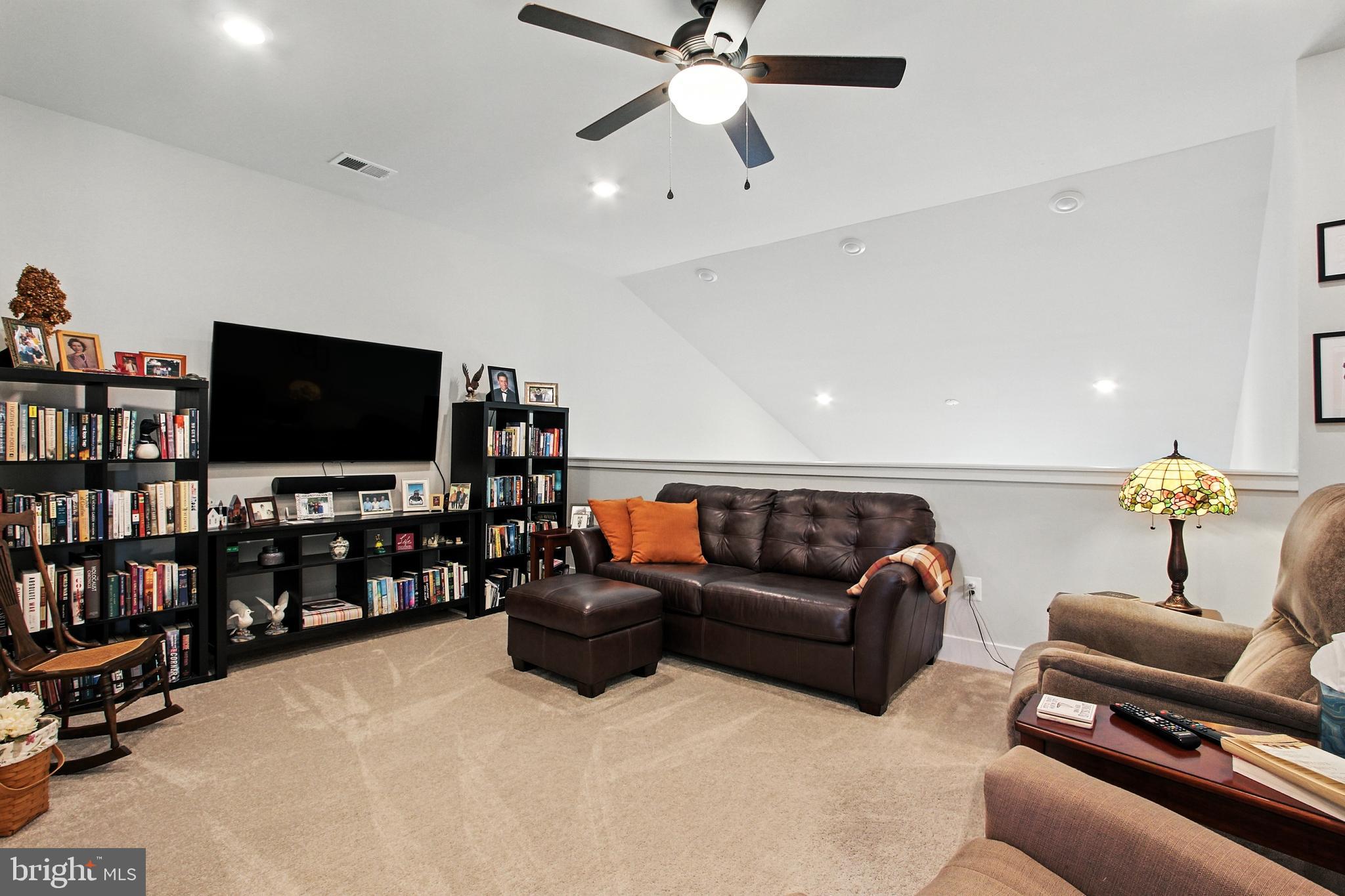 33 Tulip Tree Way Gettysburg, PA 17325 - Photo 15 of 34 a living room with furniture and a flat screen tv