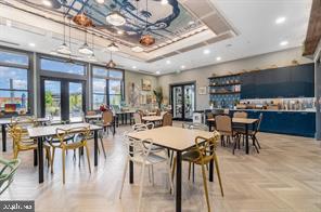 33 Tulip Tree Way Gettysburg, PA 17325 - Photo 33 of 34 a view of a dining hall with lots of furniture and a chandelier