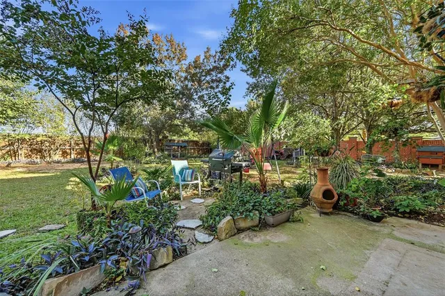 a view of a garden with an trees