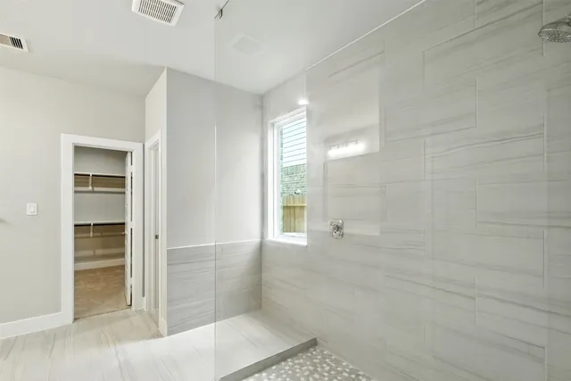 a view of an empty walk in closet