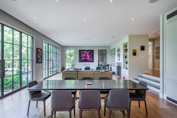 a kitchen with a refrigerator and a sink