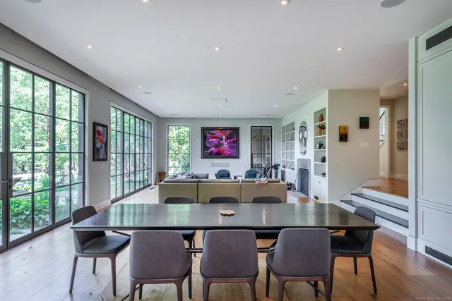 a kitchen with a refrigerator and a sink