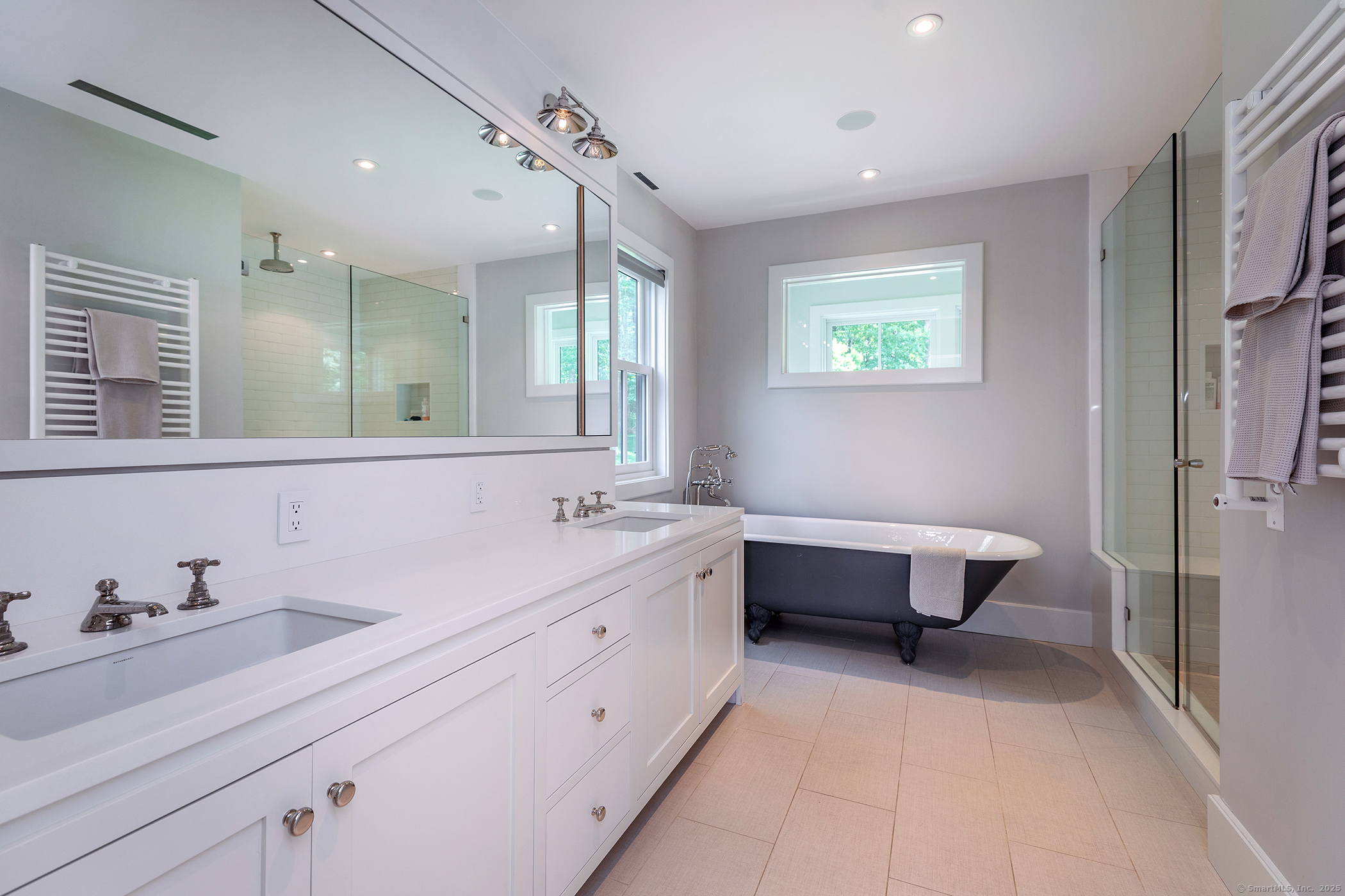 85 West Church Hill Road Washington, CT 06794 - Photo 21 of 38 a bathroom with a tub sink and mirror