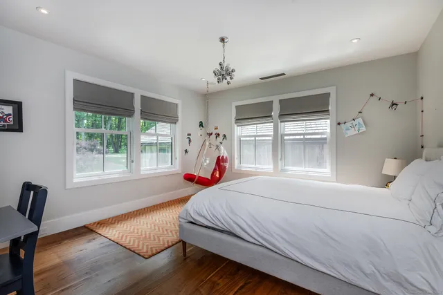 a bathroom with a granite countertop toilet a sink and bathtub