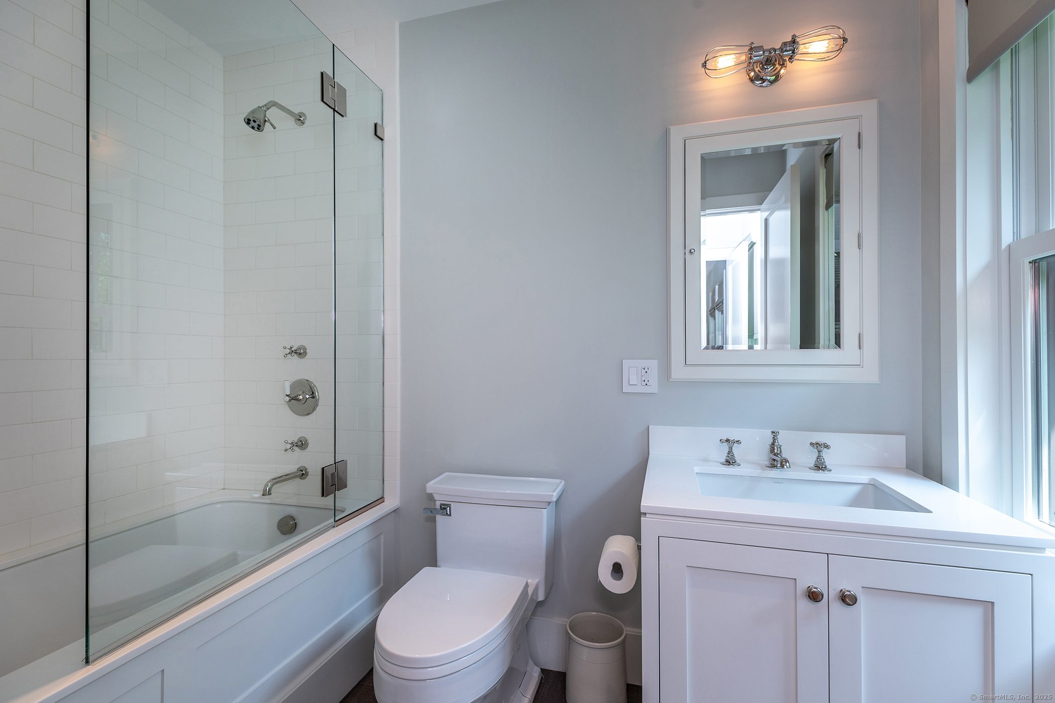 85 West Church Hill Road Washington, CT 06794 - Photo 23 of 38 a bathroom with a sink a toilet and shower