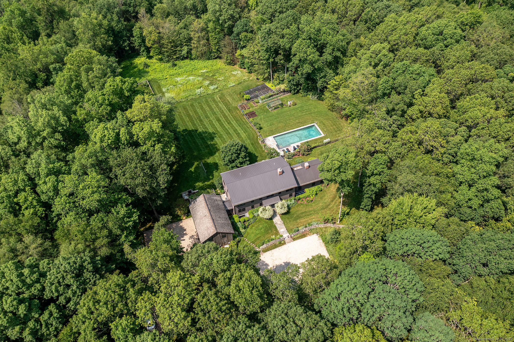 85 West Church Hill Road Washington, CT 06794 - Photo 3 of 38 an aerial view of a house with a yard