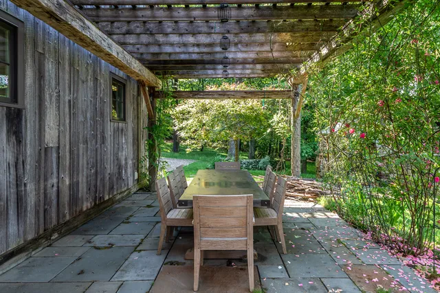 a table and chairs in a patio