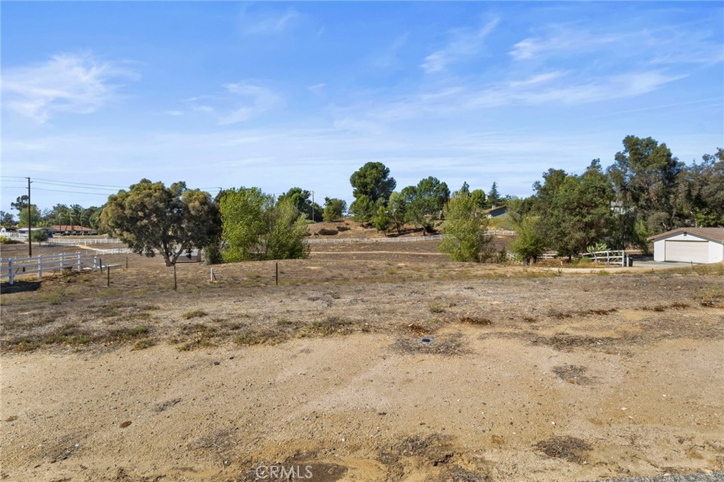 30770 Avenida Buena Suerte Temecula, CA 92591 - Photo 18 of 24 a view of ocean beach with large trees
