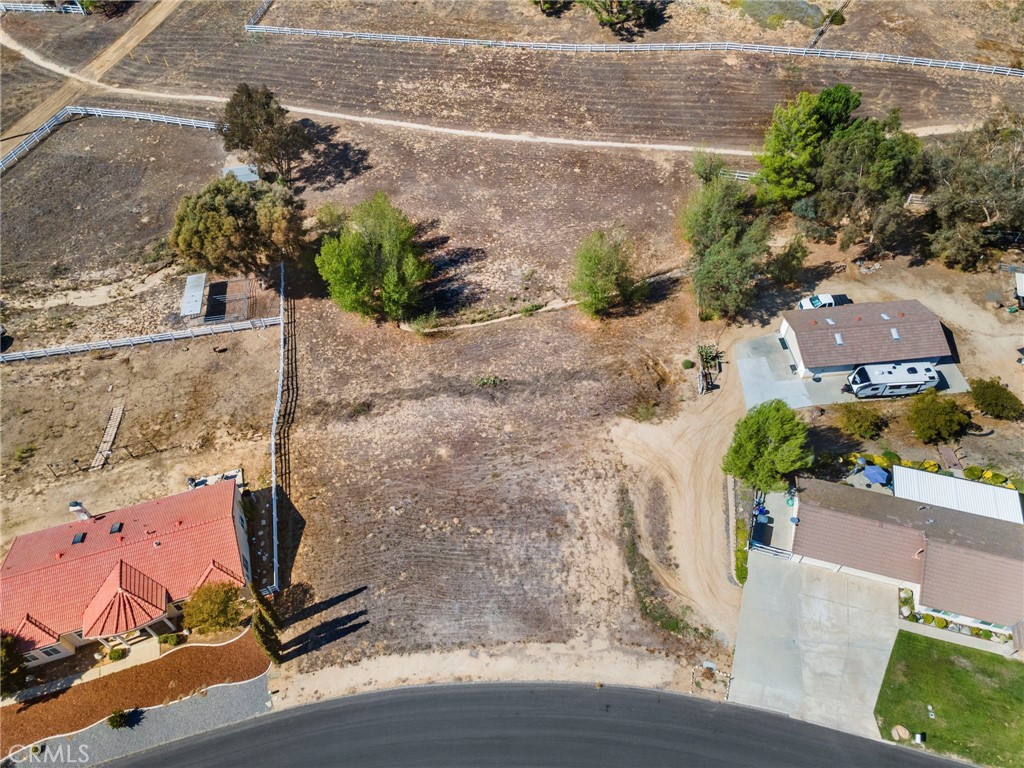 30770 Avenida Buena Suerte Temecula, CA 92591 - Photo 2 of 24 an aerial view of a house with a yard