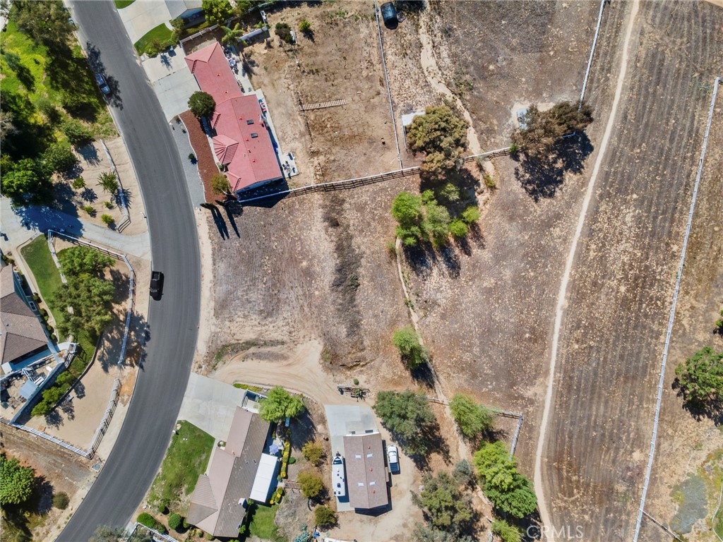 30770 Avenida Buena Suerte Temecula, CA 92591 - Photo 3 of 24 an aerial view of a house with a yard