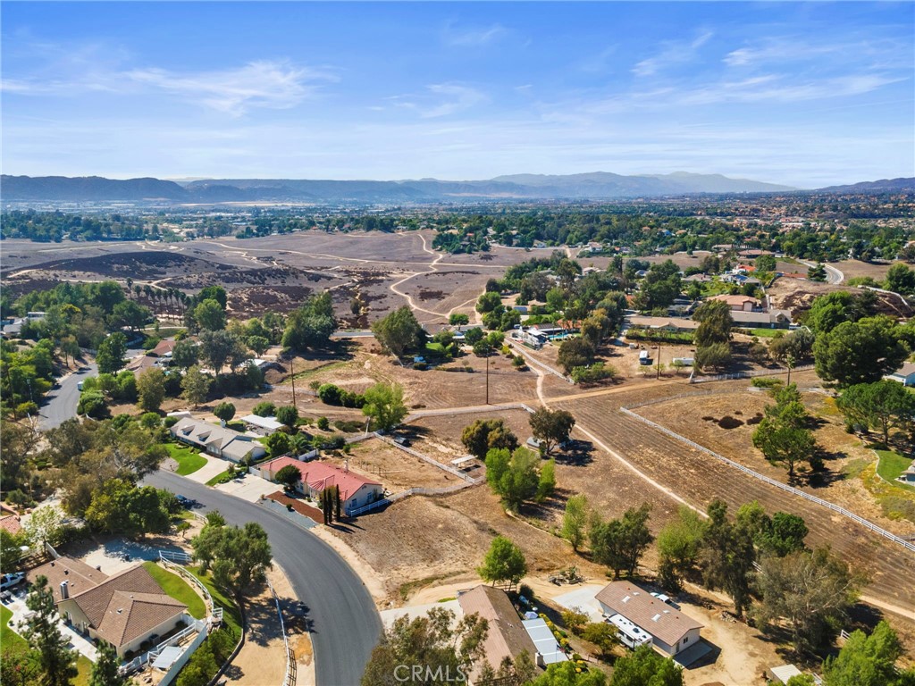 30770 Avenida Buena Suerte Temecula, CA 92591 - Photo 5 of 24 an aerial view of a city with lots of residential buildings
