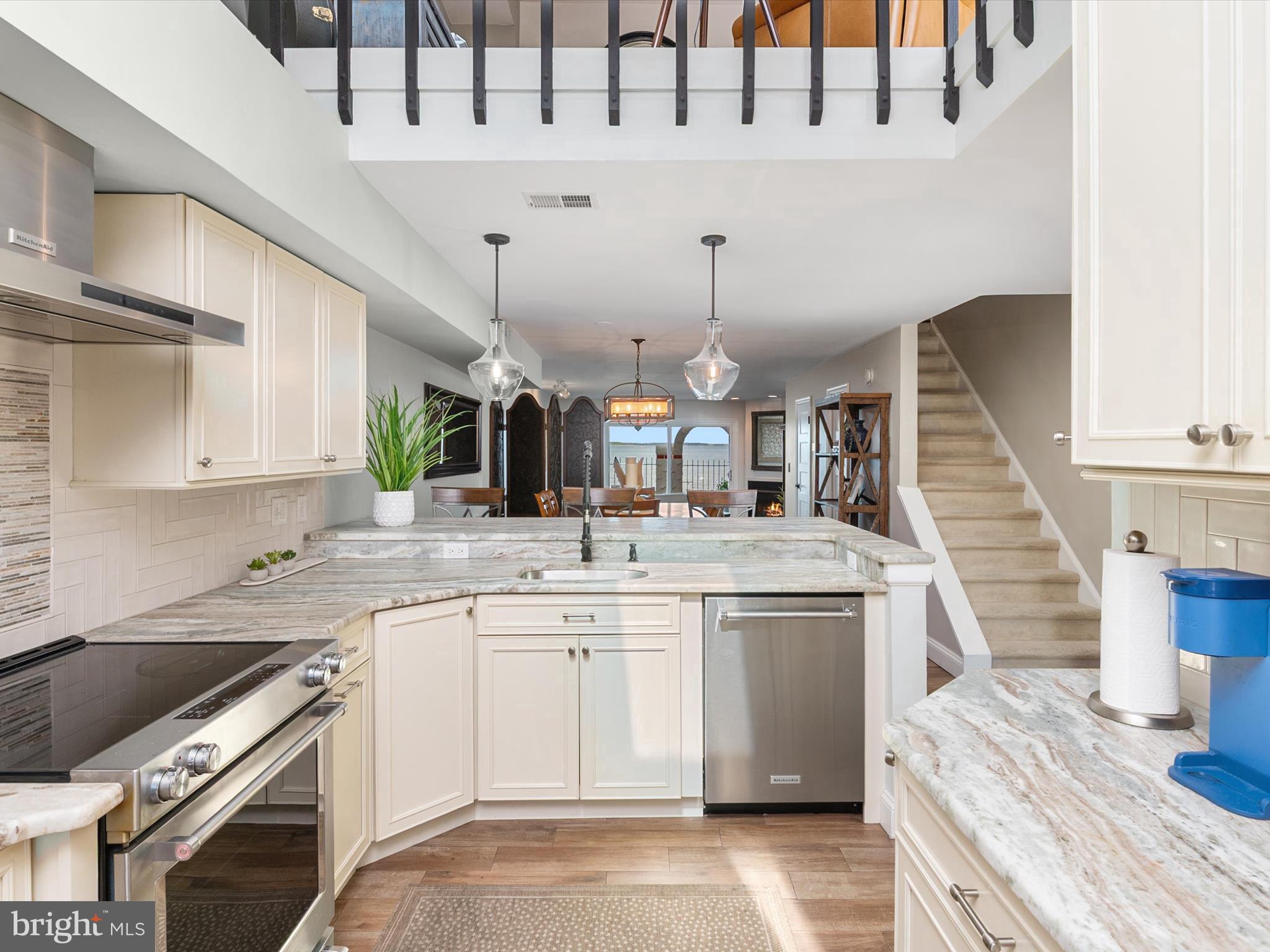 32 Queen Anne Way Chester, MD 21619 - Photo 11 of 61 a kitchen with a sink and stove
