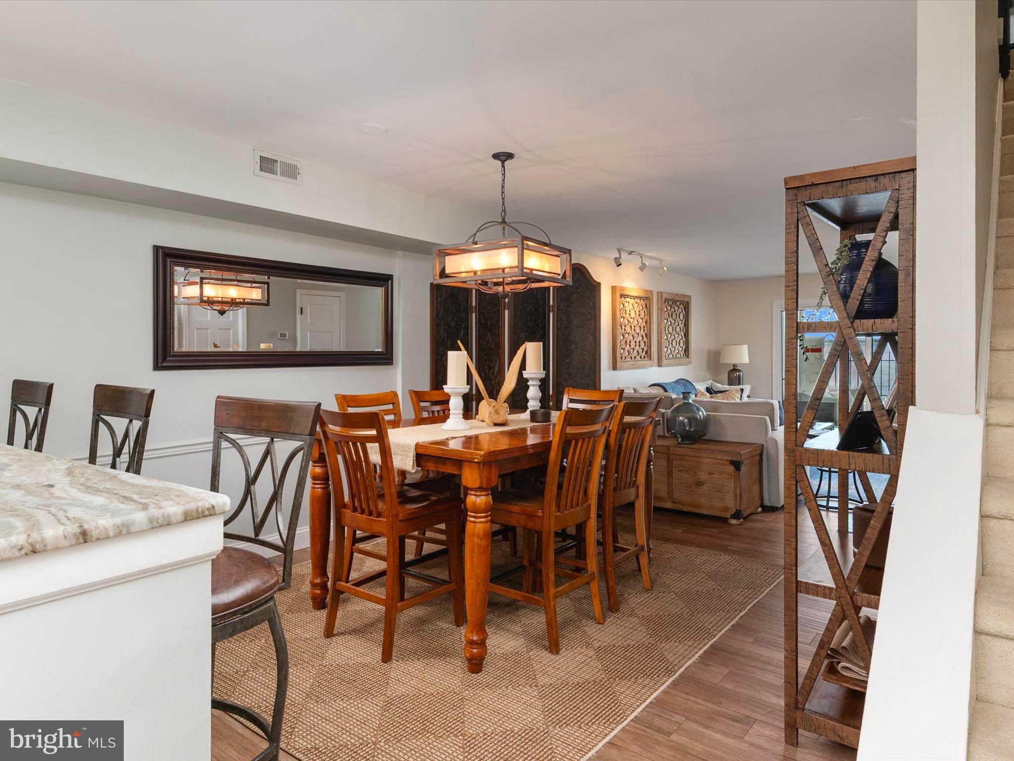 32 Queen Anne Way Chester, MD 21619 - Photo 59 of 61 a view of a dining room with furniture and chandelier
