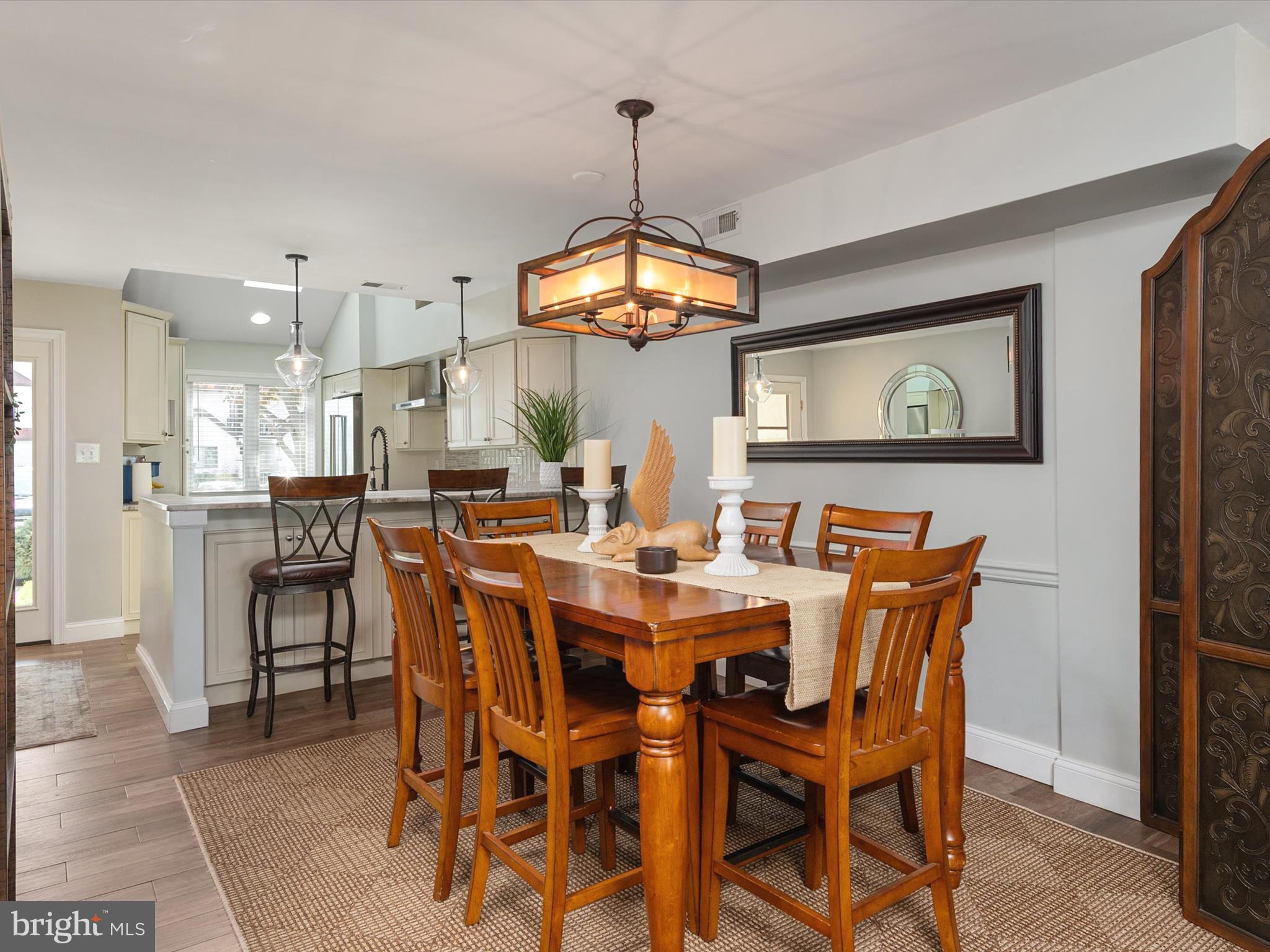 32 Queen Anne Way Chester, MD 21619 - Photo 12 of 61 a view of a dining room with furniture