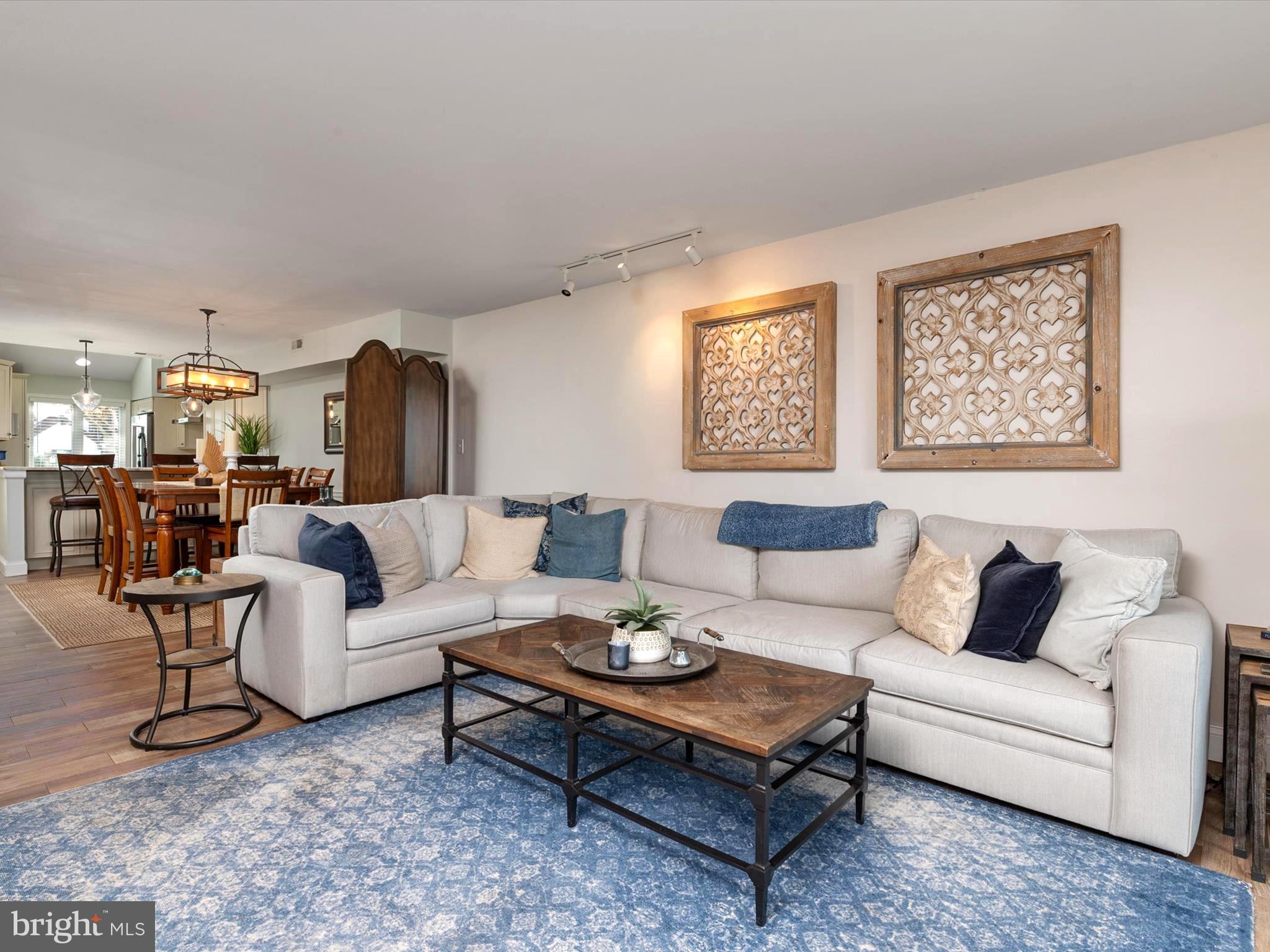 32 Queen Anne Way Chester, MD 21619 - Photo 60 of 61 a living room with furniture potted plant and a window