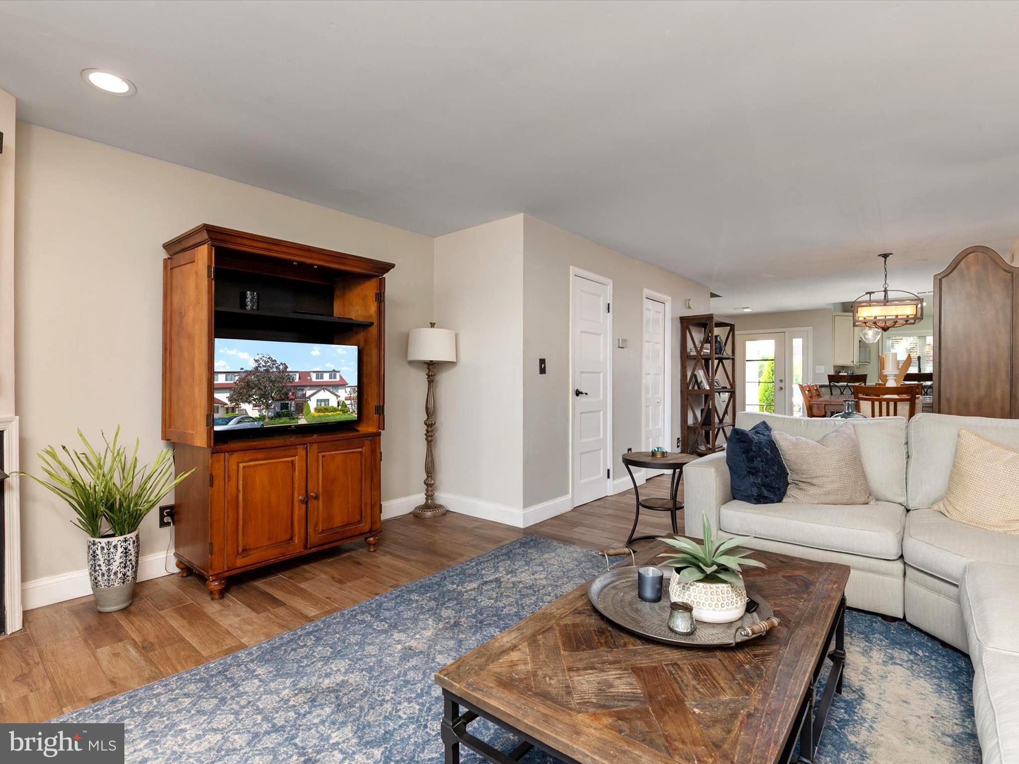 32 Queen Anne Way Chester, MD 21619 - Photo 61 of 61 a living room with furniture and a wooden floor