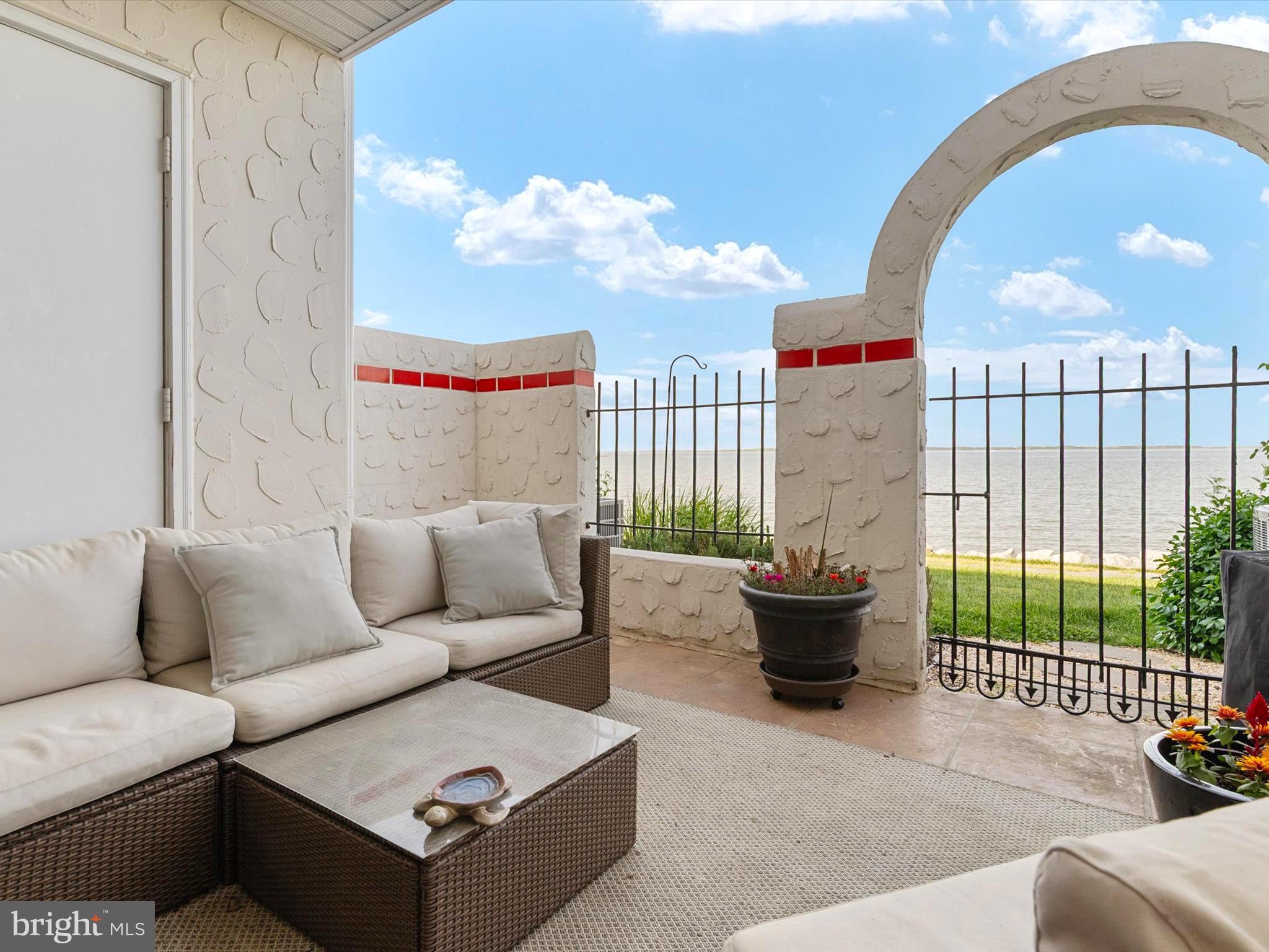 32 Queen Anne Way Chester, MD 21619 - Photo 15 of 61 a living room with furniture and a potted plant
