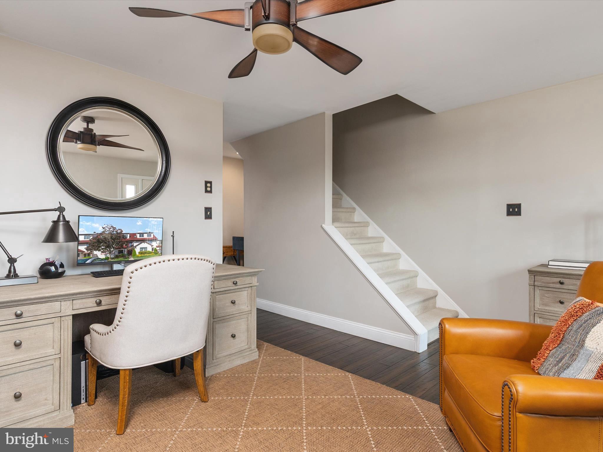32 Queen Anne Way Chester, MD 21619 - Photo 19 of 61 a living room with furniture and a mirror