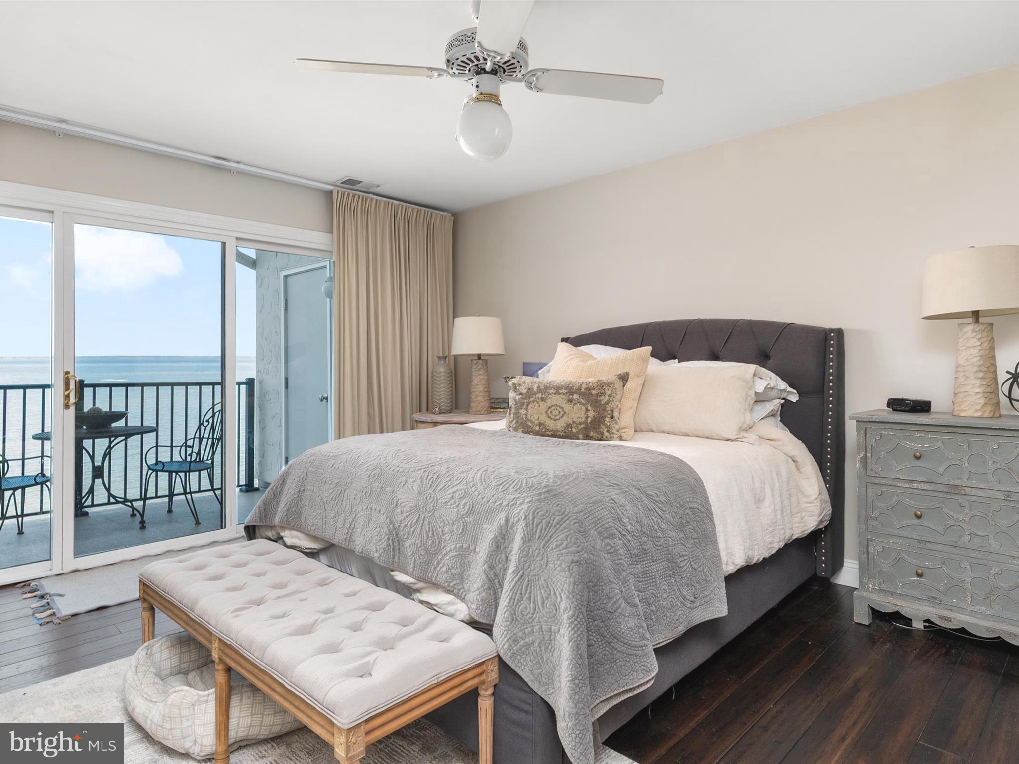 32 Queen Anne Way Chester, MD 21619 - Photo 20 of 61 a bedroom with a bed and large window
