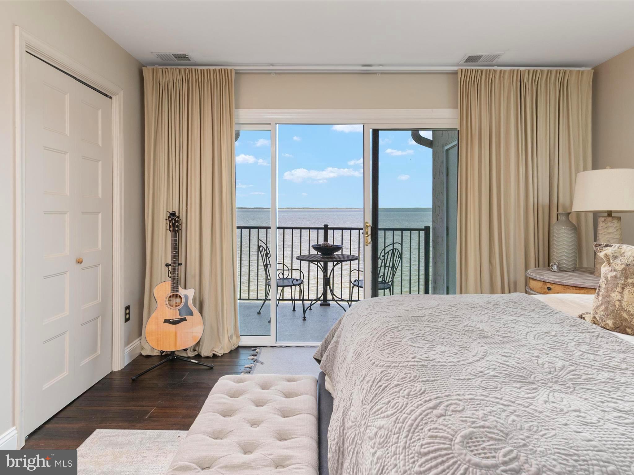 32 Queen Anne Way Chester, MD 21619 - Photo 21 of 61 a bedroom with a bed and a large window