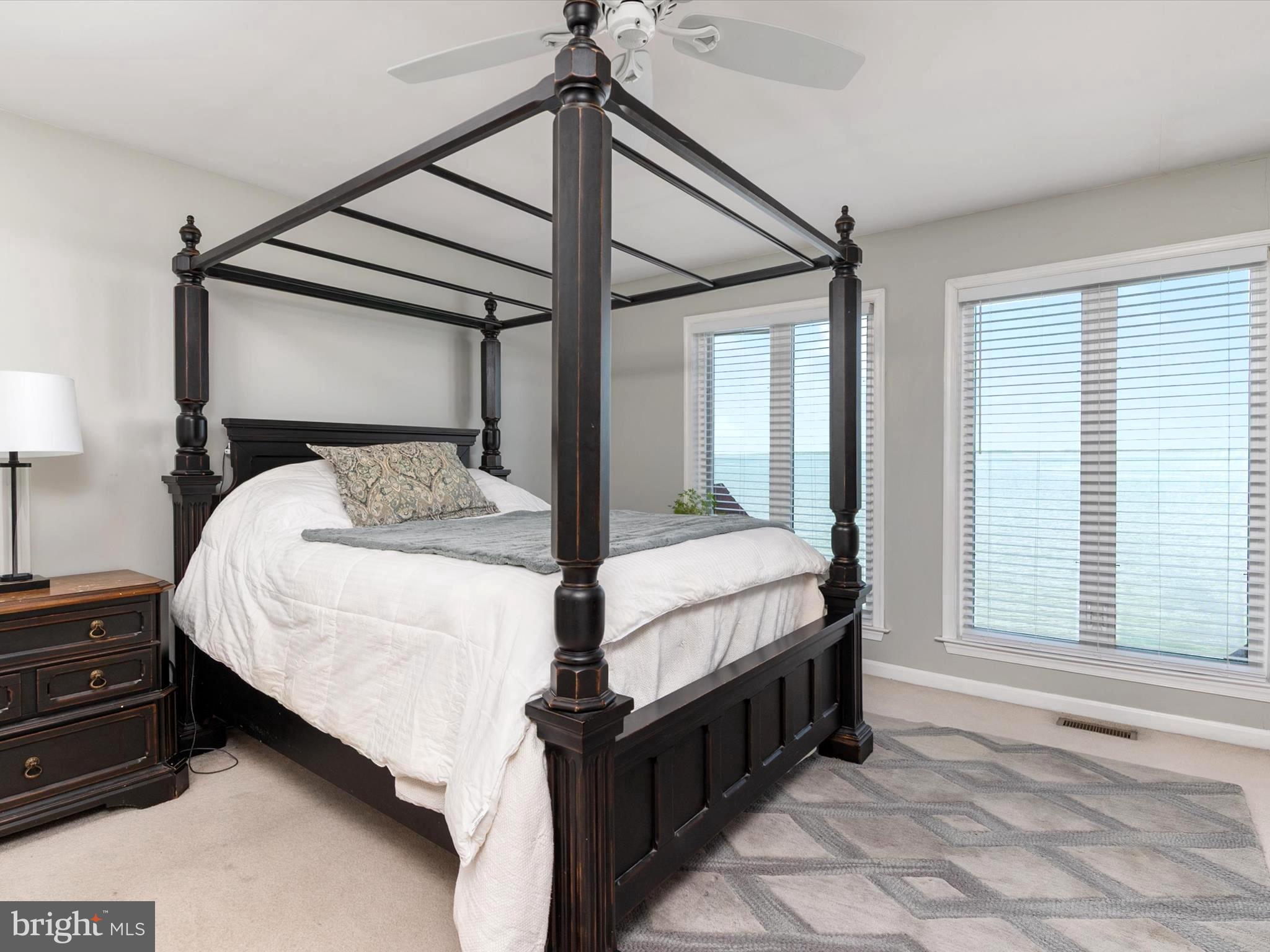 32 Queen Anne Way Chester, MD 21619 - Photo 28 of 61 a bedroom with a bed next to a window