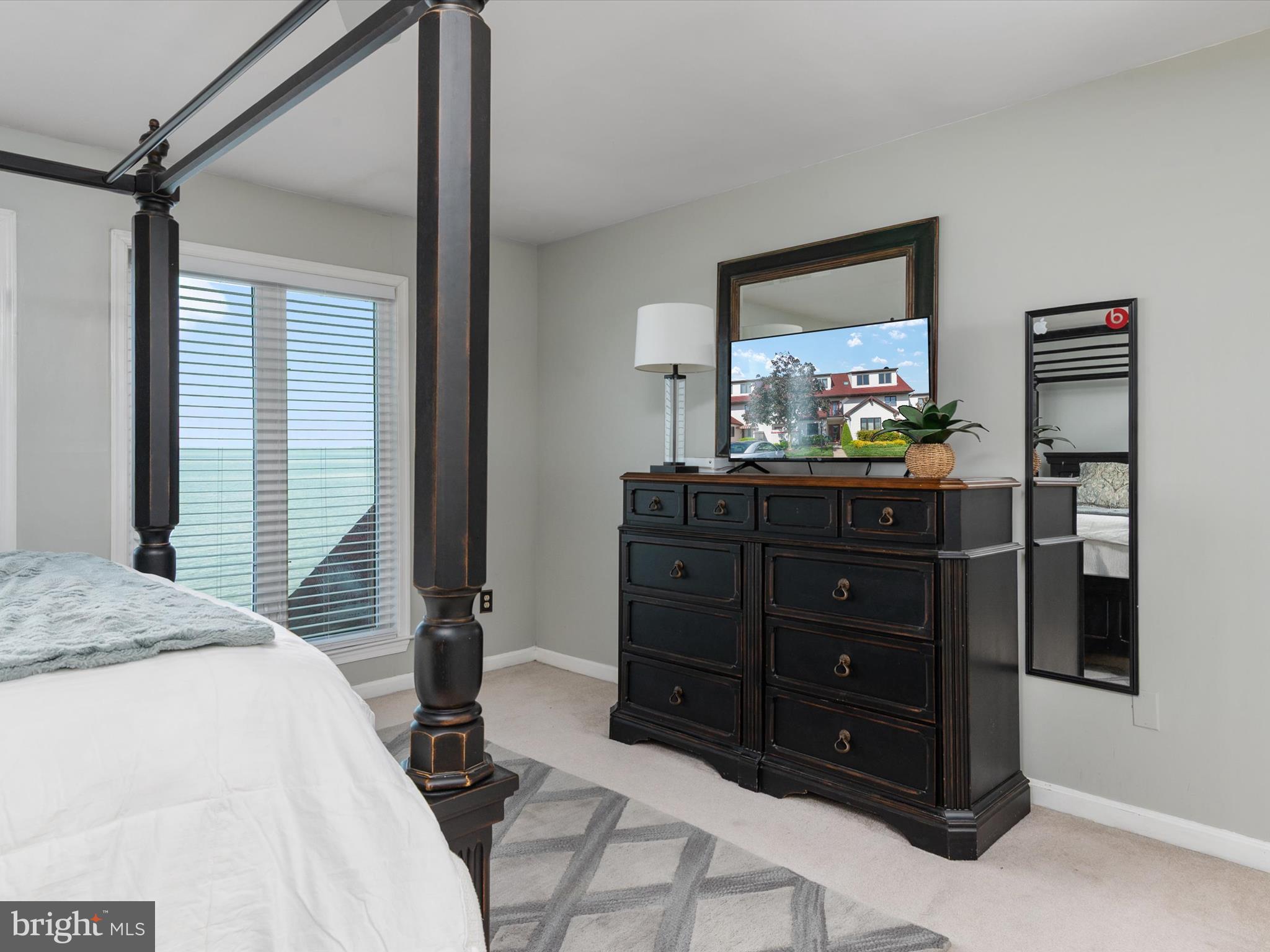 32 Queen Anne Way Chester, MD 21619 - Photo 29 of 61 a bedroom with a bed and a dresser