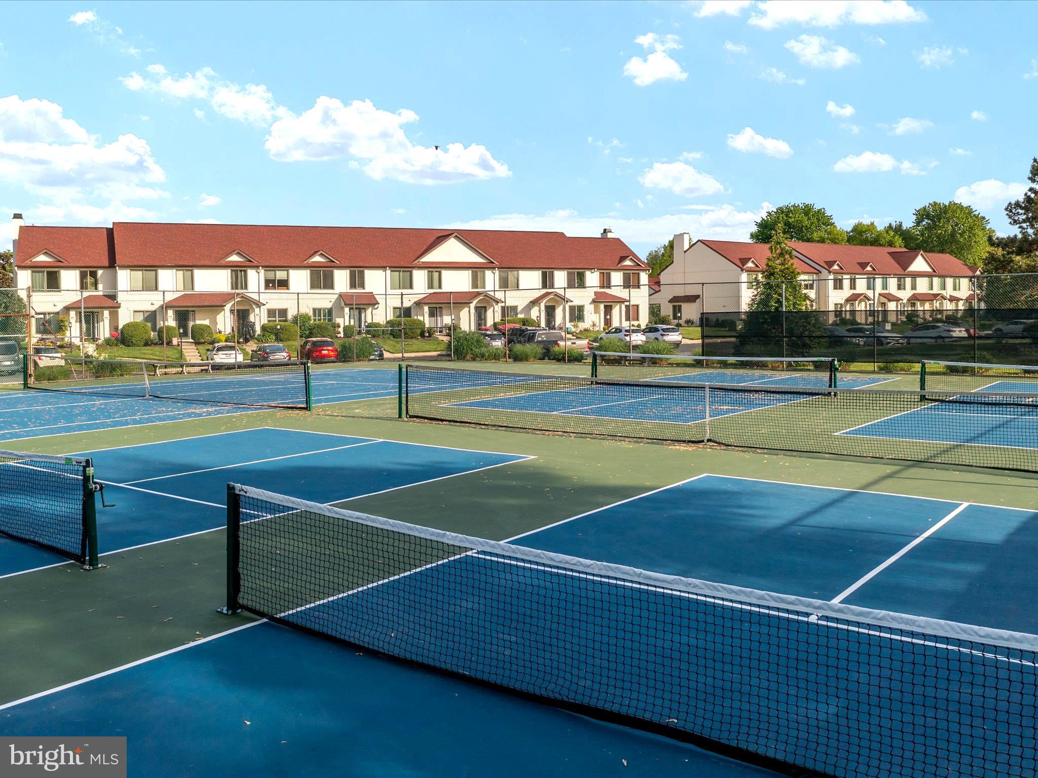 32 Queen Anne Way Chester, MD 21619 - Photo 40 of 61 a view of an outdoor space and tennis court