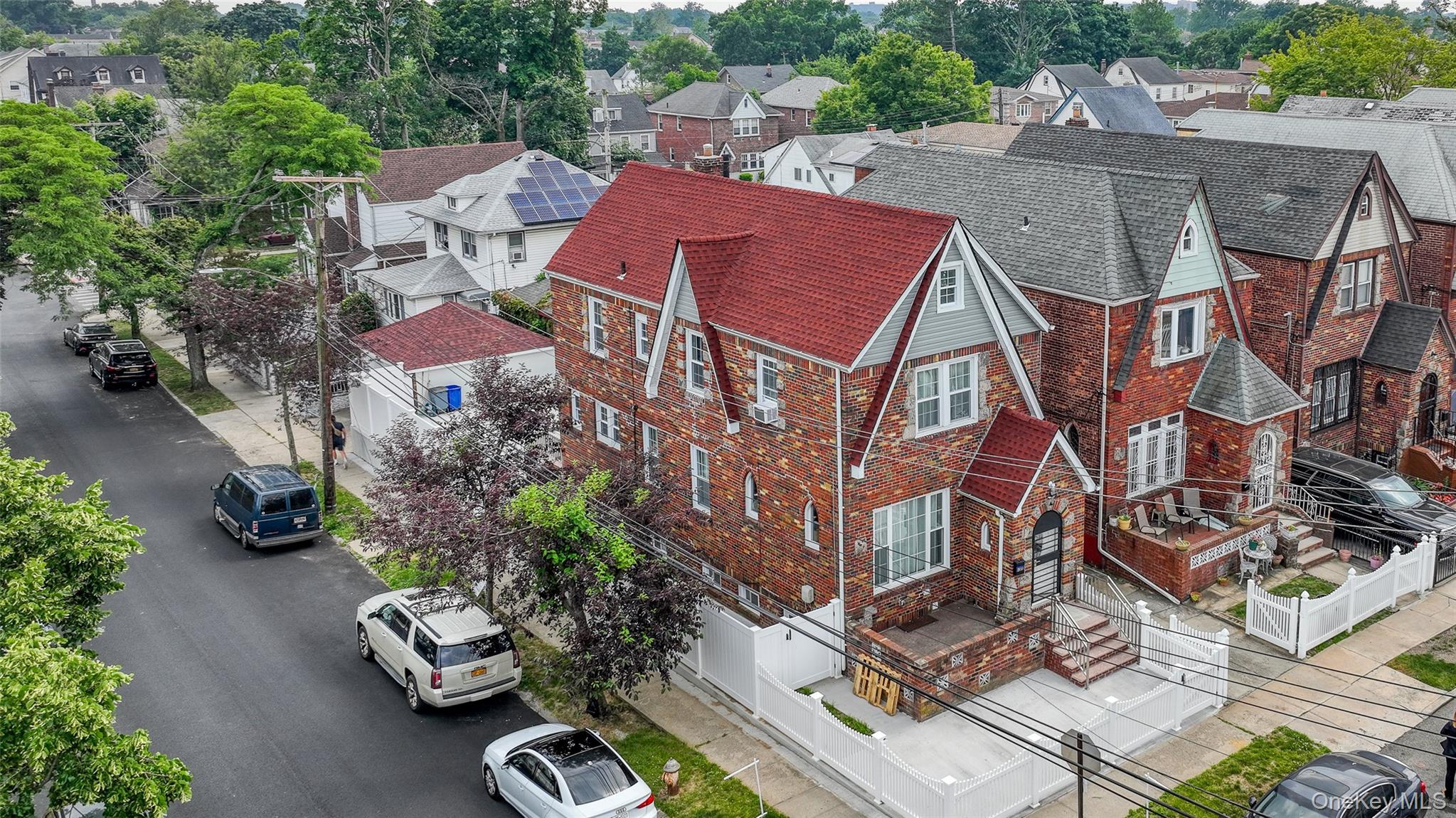191-68 115th Road Queens, NY 11412 - Photo 12 of 20 an aerial view of multiple houses with yard