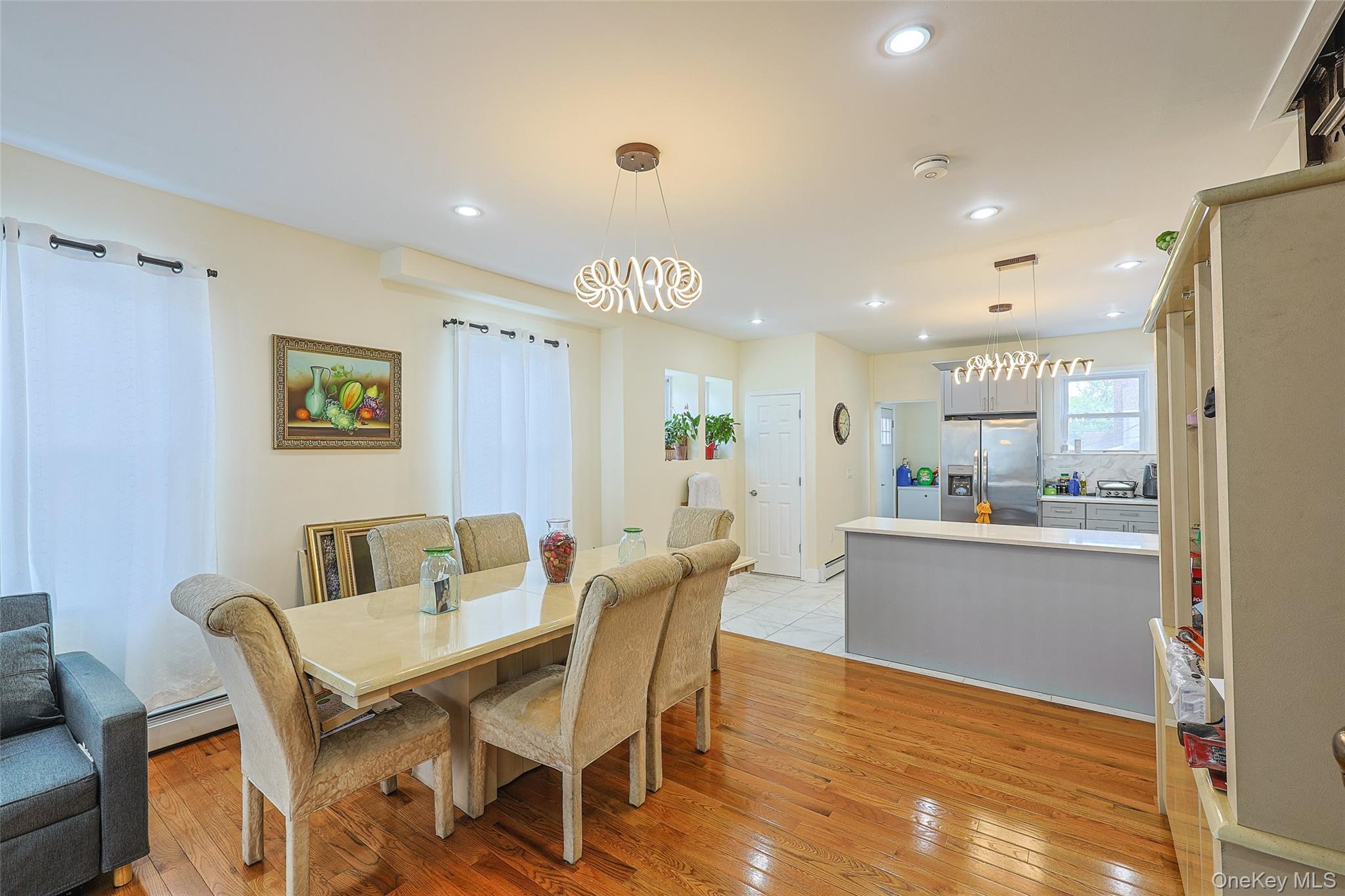 191-68 115th Road Queens, NY 11412 - Photo 6 of 20 a view of a dining room with furniture window and wooden floor