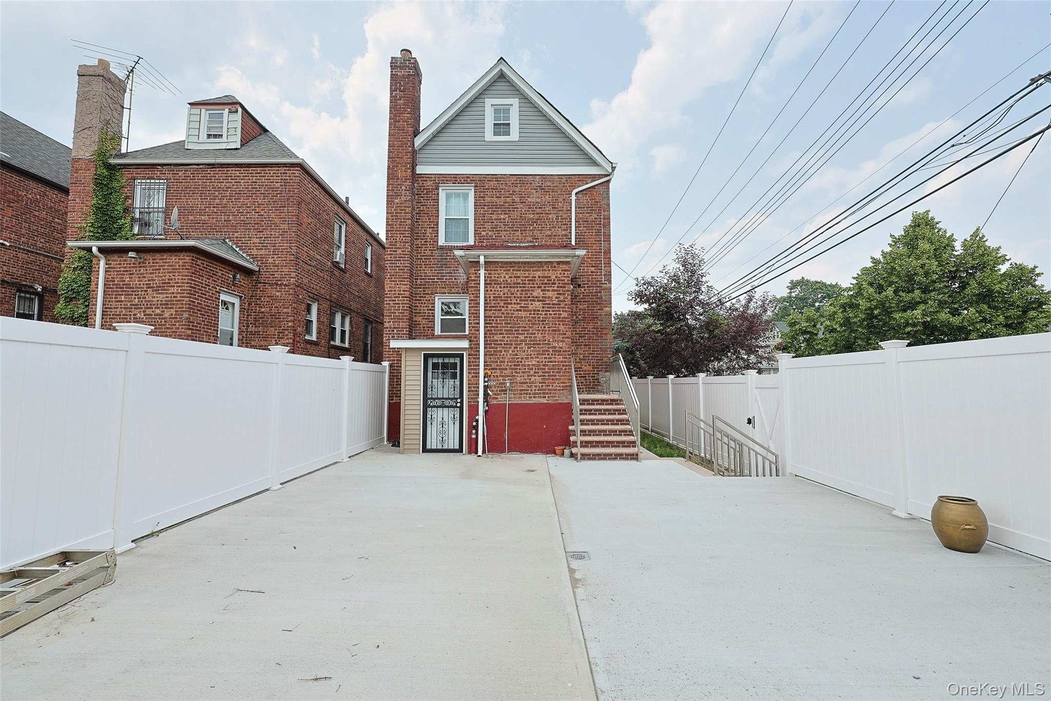 191-68 115th Road Queens, NY 11412 - Photo 10 of 20 a view of residential house with stairs