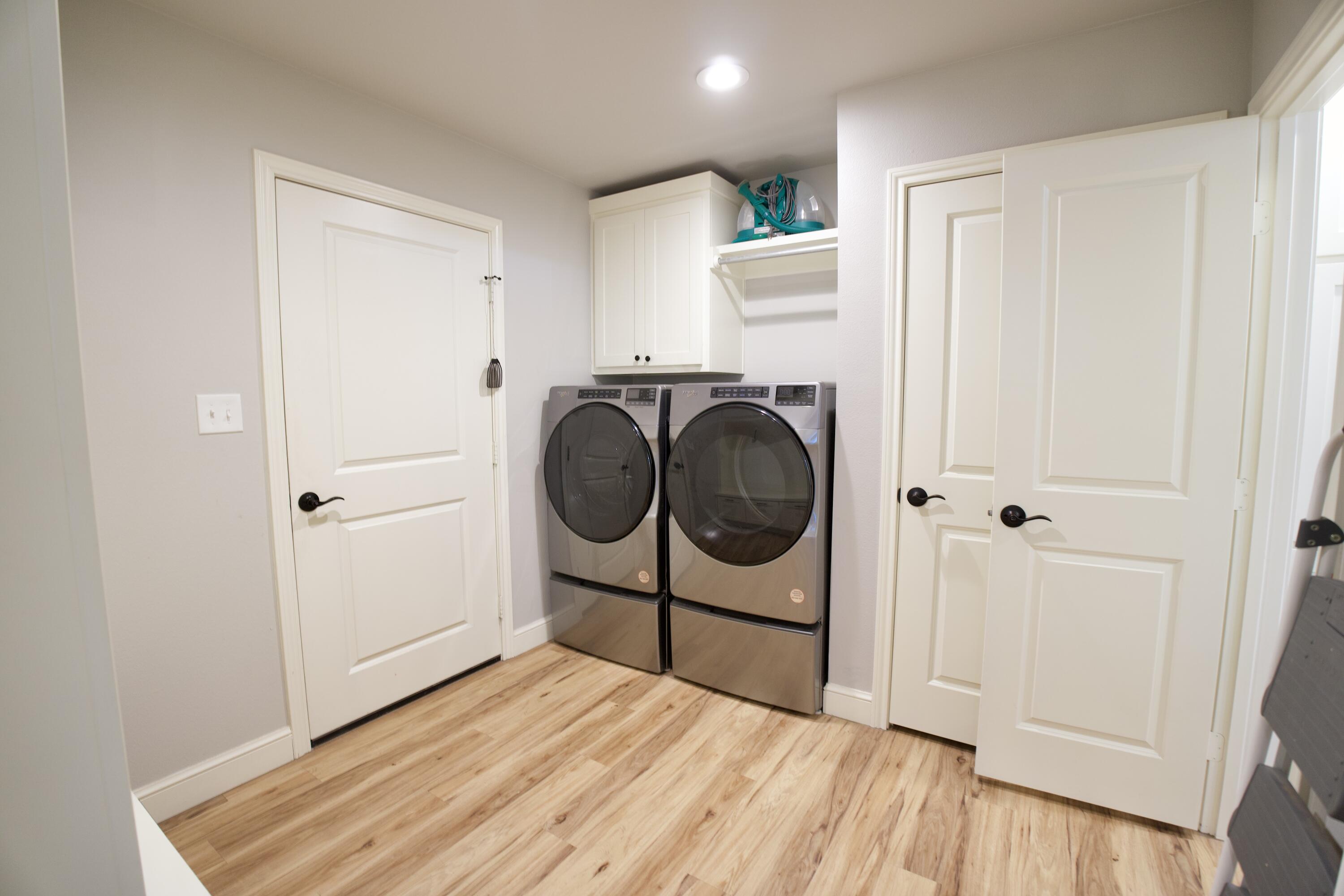 7405 County Road 3700 Slaton, TX 79364 - Photo 22 of 26 a view of a room with washer and dryer