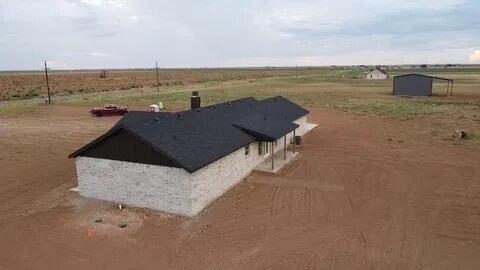 7405 County Road 3700 Slaton, TX 79364 - Photo 7 of 26 a view of a lake with a terrace