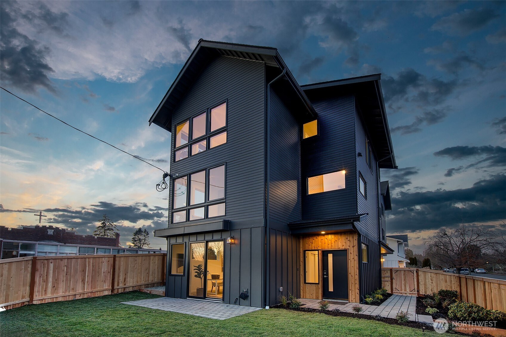 a view of a building with a yard