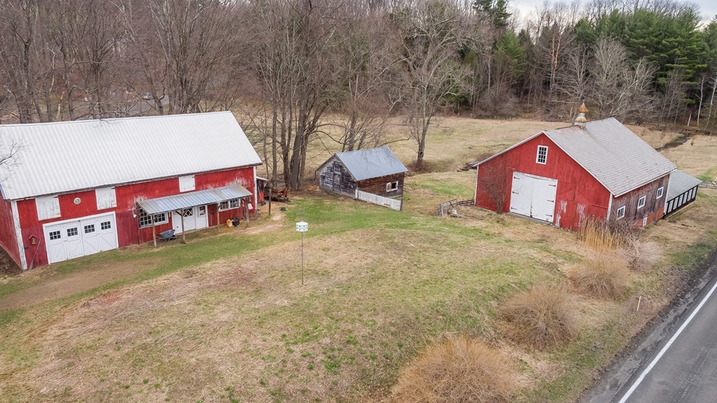 1301 Conway Road Ashfield, MA 01330 - Photo 4 of 26 a view of a large house with a yard and large trees