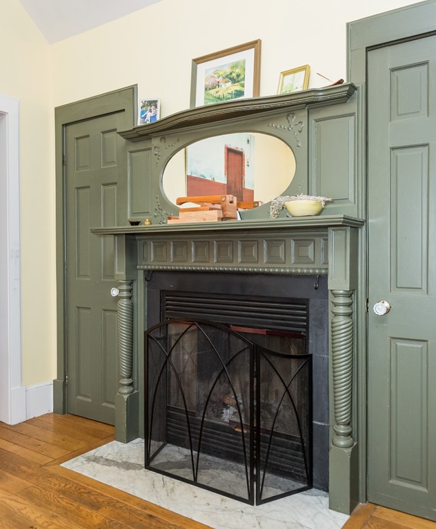 1301 Conway Road Ashfield, MA 01330 - Photo 7 of 26 a close view of a fireplace in kitchen