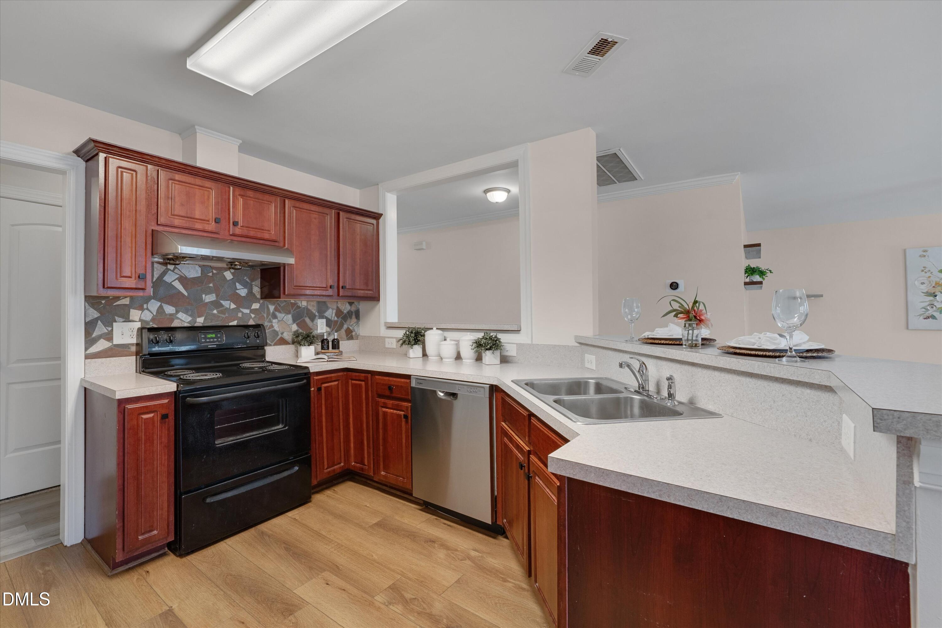 2604 Spring Drive Raleigh, NC 27610 - Photo 6 of 23 Eat-in Kitchen: All Appliances Convey
