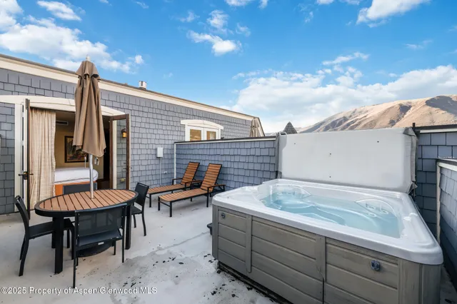 a bathroom with a granite countertop sink a mirror and a