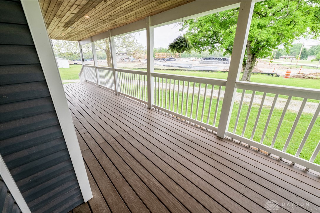 190 Swailes Road Troy, OH 45373 - Photo 59 of 82 This inviting porch features wood-look flooring and railings, perfect for enjoying the views.