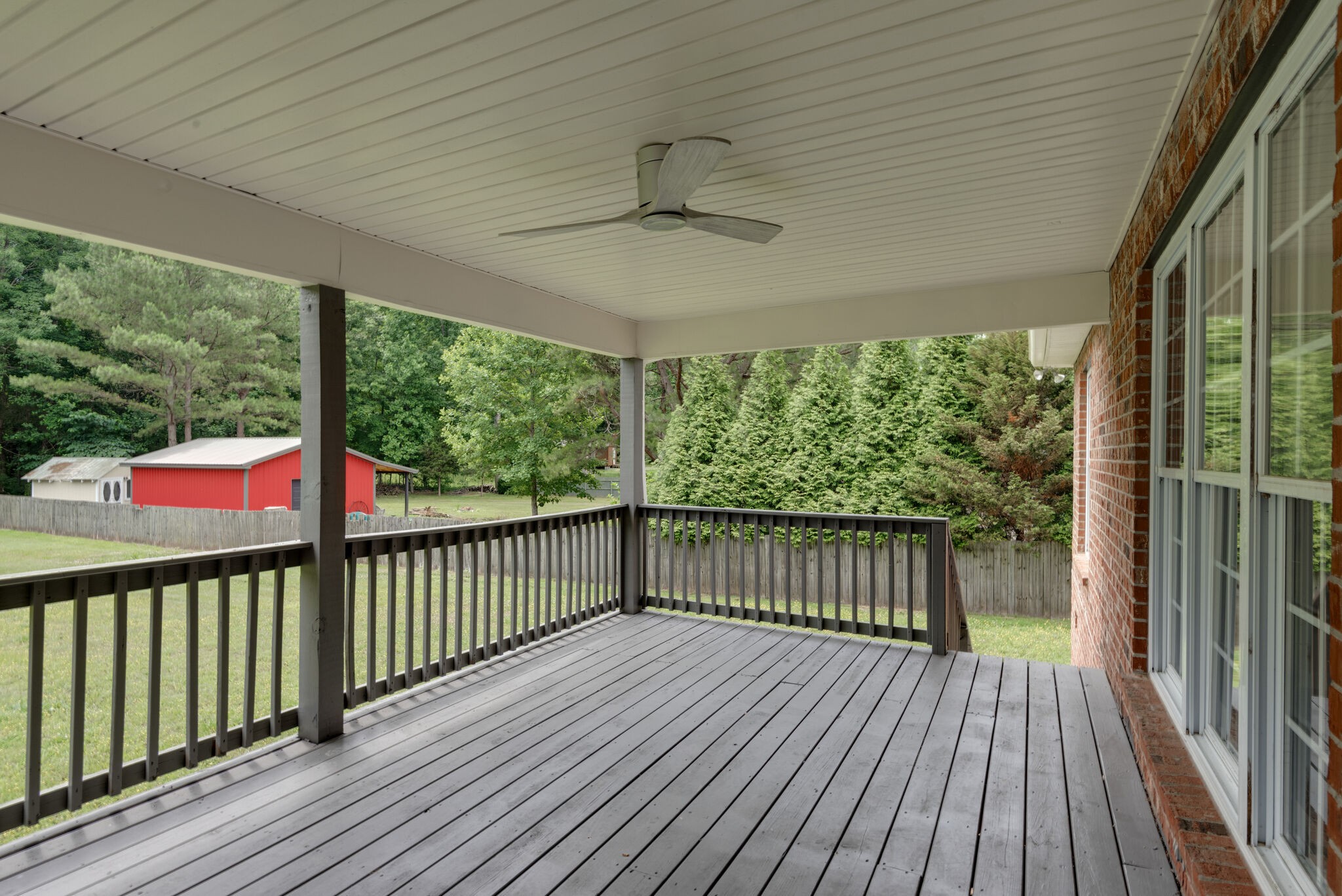 2005 Spencer Mill Road Burns, TN 37029 - Photo 25 of 30 a view of a balcony with wooden floor