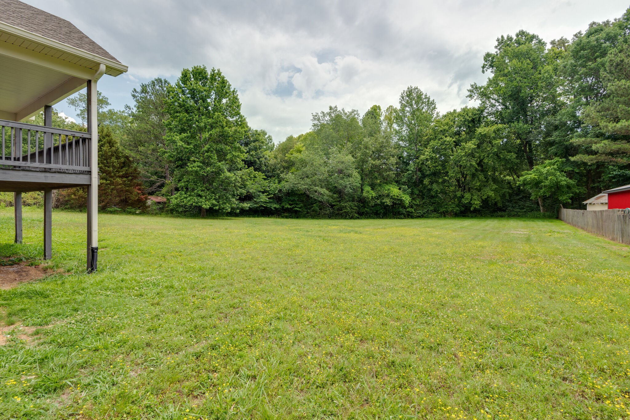 2005 Spencer Mill Road Burns, TN 37029 - Photo 27 of 30 a view of a garden and basketball court