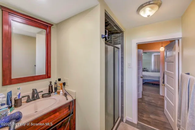 a bedroom with a bed and dresser