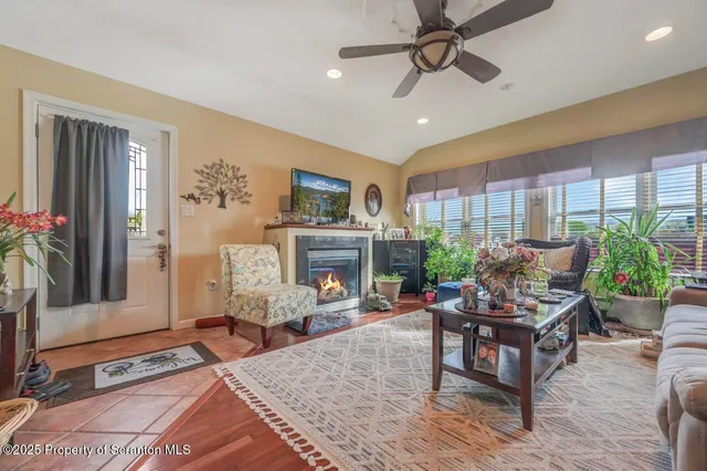 a living room with furniture and a rug